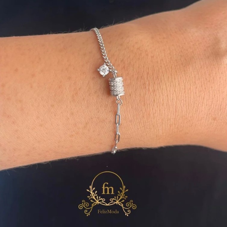 Oval silver bracelet with side stone